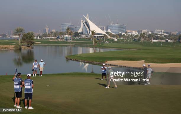 General view as Rory McIlroy of Northern Ireland putts on the 10th green on Day One of the Dubai Invitational at Dubai Creek Golf and Yacht Club on...