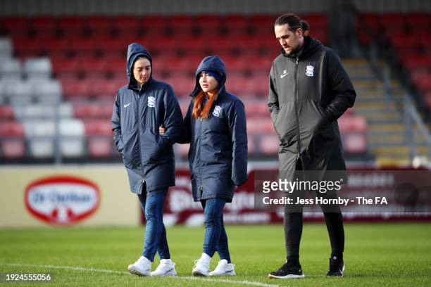 Jade Moore , Martha Harris and Darren Carter, Manager of Birmingham City, inspect the pitch prior to the Adobe Women's FA Cup Fourth Round match...