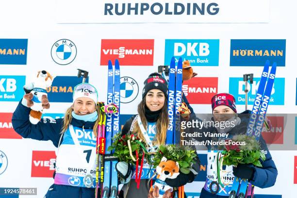 Ingrid Landmark Tandrevold of Norway takes second place, Lisa Vittozzi of Italy takes first place, Juni Arnekleiv of Norway takes third place during...