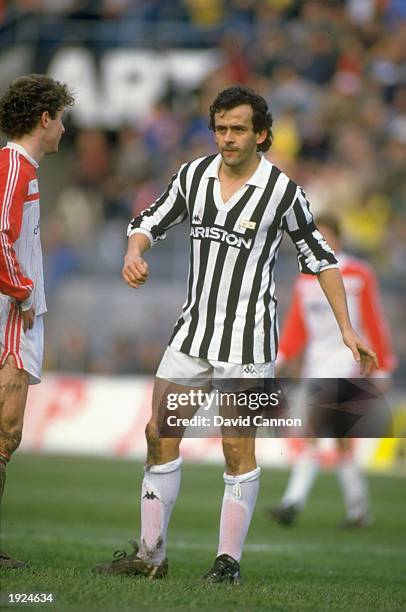 Michel Platini of Juventus takes a rest during an Italian Serie A match against Bari at the San Nicola Stadium in Bari, Italy. Juventus won the match...