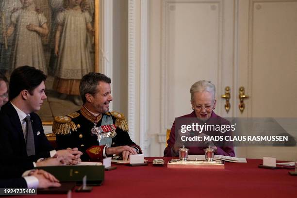 Queen Margrethe II of Denmark signs a declaration of abdication as Crown Prince Frederik of Denmark becomes King Frederik X of Denmark and Prince...