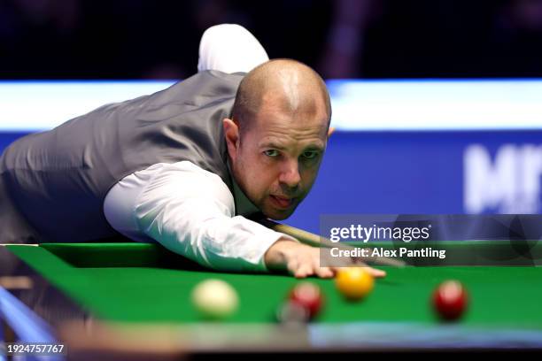 Barry Hawkins of England plays a shot in his quarter-final match against Ronnie O'Sullivan of England during day five of the MrQ Masters Snooker 2024...