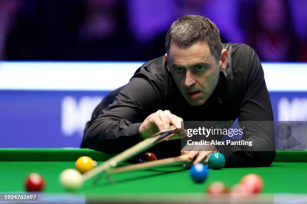 Ronnie O'Sullivan of England plays a shot in his quarter-final match against Barry Hawkins of England during day five of the MrQ Masters Snooker 2024...