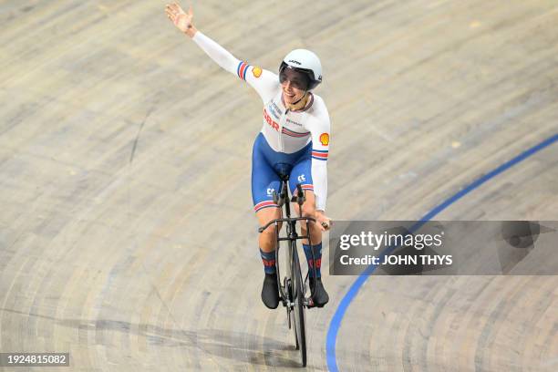 First placed Britain's Josie Knight celebrates winning gold after competing in the Women's Individual Pursuit finals race during the fifth day of the...
