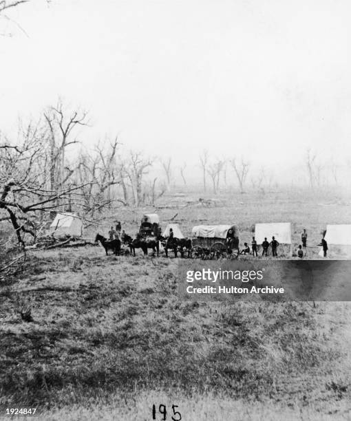 Captain Sanderson's camp at the ford while gathering and burying bones following the death of General Custer at the Battle of Little Big Horn, 1876.