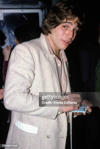 American actor Tony Danza, wearing an oatmeal-coloured jacket over a red-and-white checked shirt, United States, circa 1990.