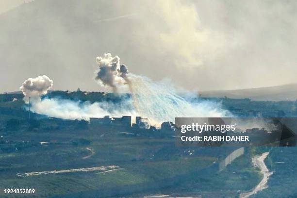 Smoke billows in the area of the Lebanese village of Kfar Kila during Israeli shelling on on January 14 amid ongoing cross-border tensions as the war...