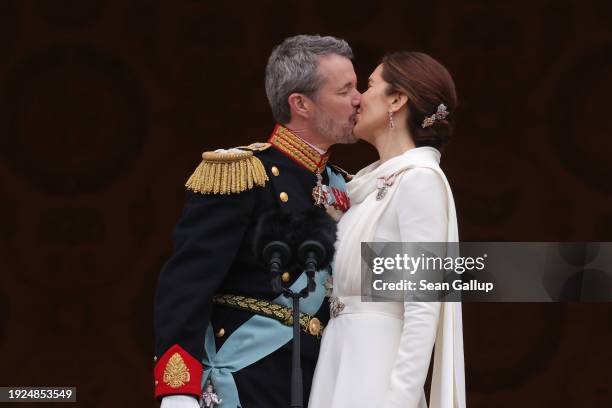 Danish King Frederik X kisses his wife Queen Mary of Denmark after his proclamation by the Prime Minister, Mette Frederiksen on the balcony of...