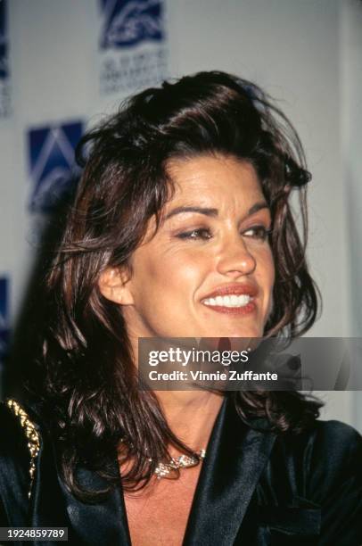 Headshot of American fashion model Janice Dickinson, wearing a black jacket, attends the AIDS Project Los Angeles 'Commitment to Life' charity...