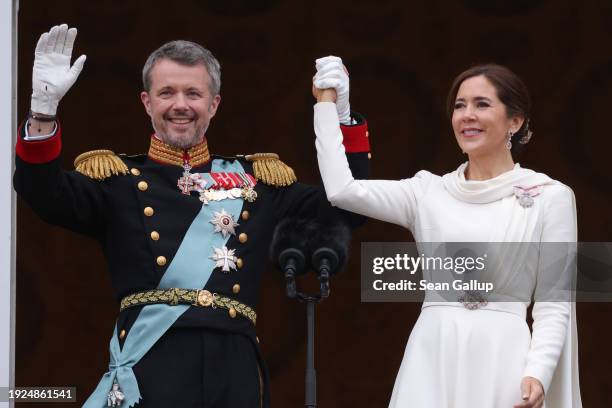 Danish King Frederik X and wife Queen Mary of Denmark wave to the crowds after his proclamation by the Prime Minister, Mette Frederiksen on the...