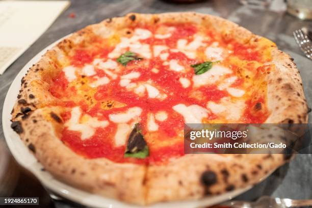 Neapolitan pizza with fresh mozzarella and basil served on a plate, Eataly, Westfield Mall, San Jose, California, December 2, 2023.