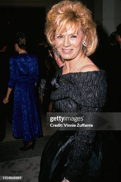 American actress Angie Dickinson, wearing a black off-shoulder outfit, attends the 17th Annual American Film Institute Lifetime Achievement Award...