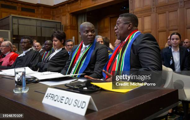 Vusimuzi Madonsela, South African Amabassador in the Netherlands, and Ronald Lamola, South African Minister of Justice prepare to attend a heraring...