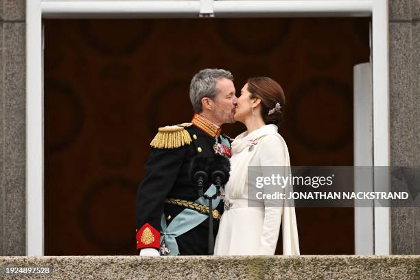 King Frederik X of Denmark and Queen Mary of Denmark kiss on the balcony of Christiansborg Palace in Copenhagen, Denmark on January 14, 2024. Denmark...