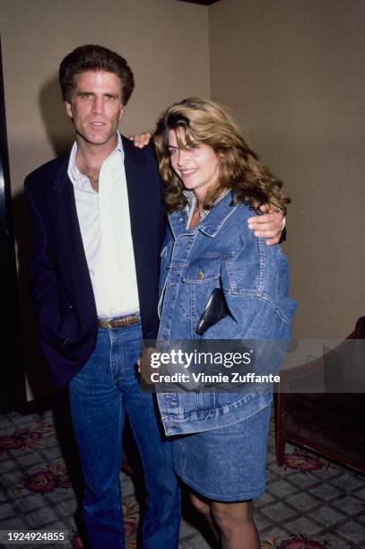 American actor Ted Danson and American actress Kirstie Alley, wearing a denim jacket and skirt, at an NBC promotional event in Los Angeles,...