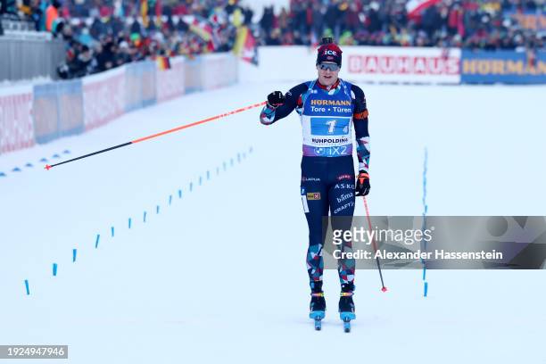 Vetle Sjaastad Christiansen of Team Norway reacts as he crosses the finish line for Norway to win the Men 4x7.5 km Relay at the BMW IBU World Cup...