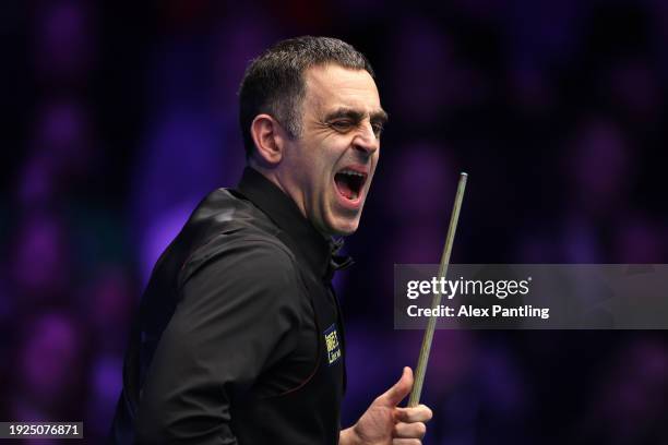 Ronnie O'Sullivan of England reacts to a shot in his quarter-final match against Barry Hawkins of England during day five of the MrQ Masters Snooker...