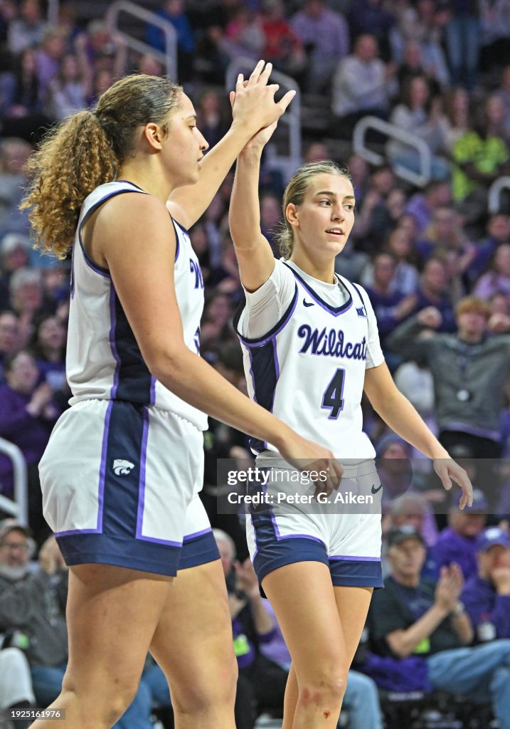 Serena Sundell and Ayoka Lee of the Kansas State Wildcats celebrate ...
