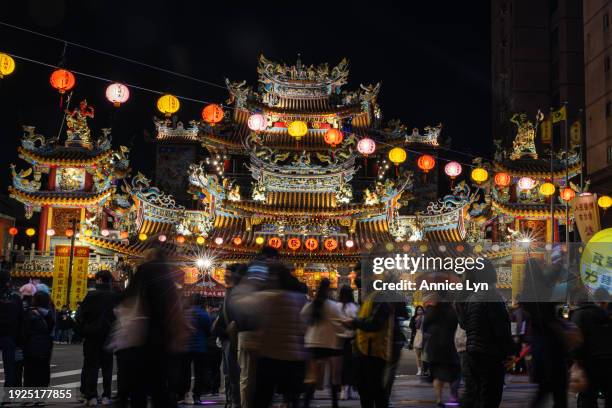 People arrive at the Songshan Ciyou Temple on January 11, 2024 in Taipei, Taiwan. Ahead of the presidential election, daily life in Taiwan unfolds...