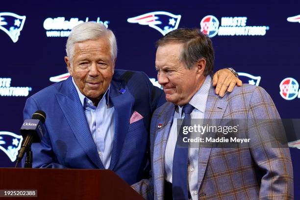 Owner Robert Kraft hugs head coach Bill Belichick of the New England Patriots during a press conference at Gillette Stadium on January 11, 2024 in...