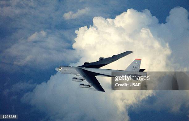 In this photo provided by the U.S. Air Force, a 40th Expeditionary Bomb Squadron B-52 Stratofortress flies home after striking multiple targets deep...