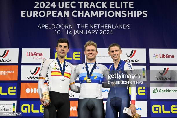 Second placed Spain's Sebastian Mora Vedri , First placed Denmark's Niklas Larsen and Third placed France's Oscar Nilsson-Julien celebrate with...