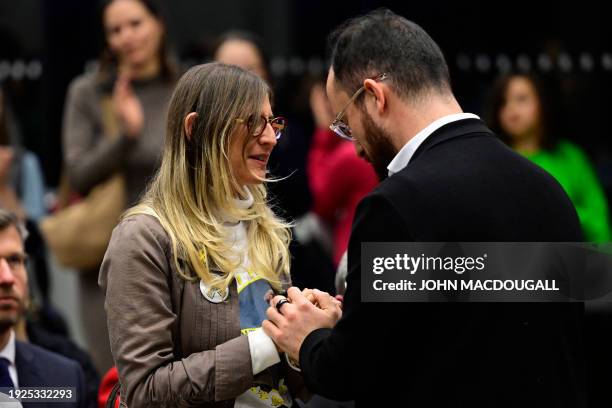 Idit Ohel, mother of Israeli pianist Alon Ohel taken hostage by Hamas, is greeted by German pianist Igor Levit after he played piano in support of...