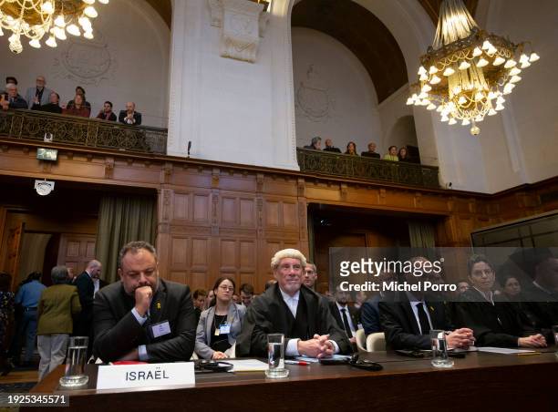 Israeli legal counsellor Tal Becker and next to him barrister Malcolm Shaw look on as they lead the Israeli delegation as South Africa has requested...