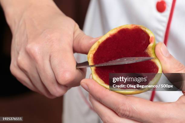 midsection of man holding dessert - jello mold stock pictures, royalty-free photos & images