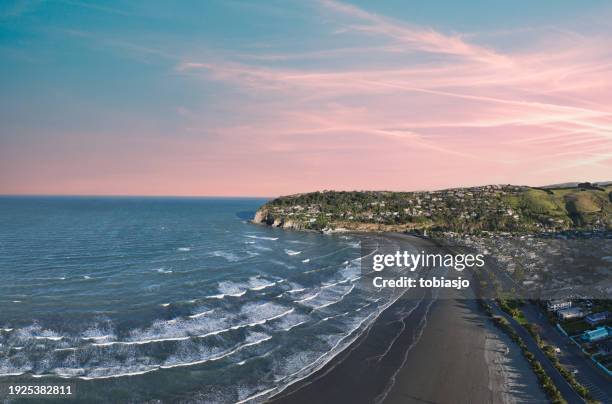 sumner beach christchurch: coastal paradise in new zealand - christchurch new zealand stock pictures, royalty-free photos & images