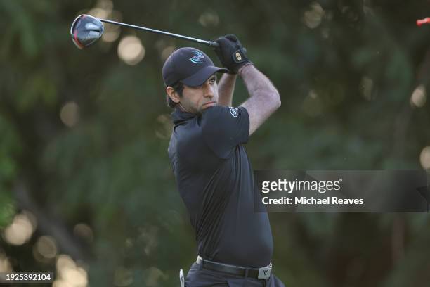 Aaron Rai of England plays his shot from the fifth tee during the first round of the Sony Open in Hawaii at Waialae Country Club on January 11, 2024...