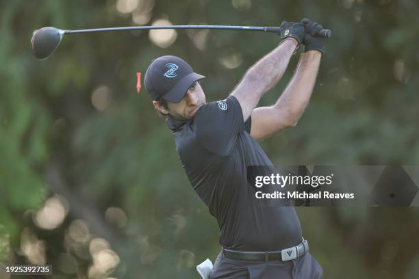 Aaron Rai of England plays his shot from the fifth tee during the first round of the Sony Open in Hawaii at Waialae Country Club on January 11, 2024...