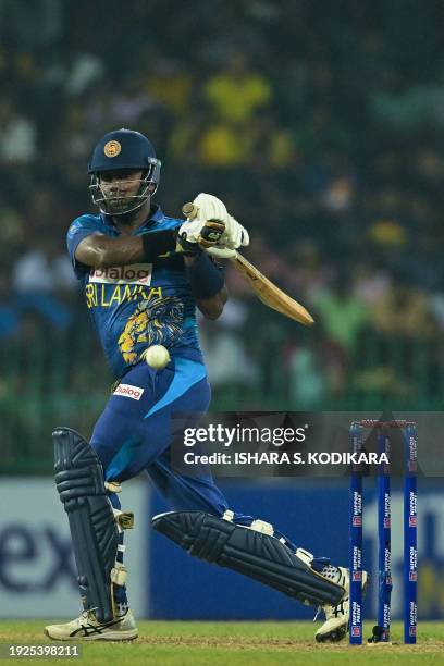 Sri Lanka's Angelo Mathews plays a shot during the first Twenty20 international cricket match between Zimbabwe and Sri Lanka at the R. Premadasa...