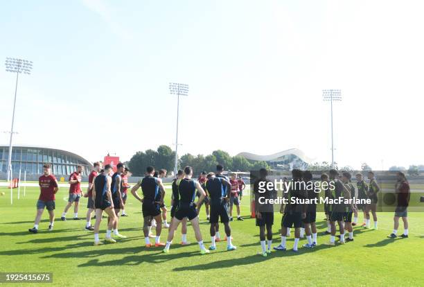 Arsenal manager Mikel Arteta speaks to his players before a training session at NAS Sports Complex on January 10, 2024 in Dubai, United Arab Emirates.