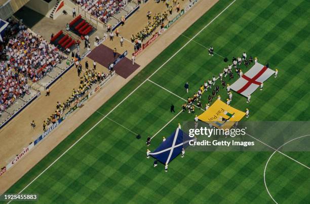 General view of the teams preparing to line up as the Fair Play and national flags are seen from the air during the 1996 UEFA European Championships...