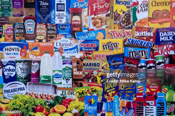 Printed picture of some of the food, snacks, products and commodities available from a small convenience store on 9th January 2024 in Birmingham,...