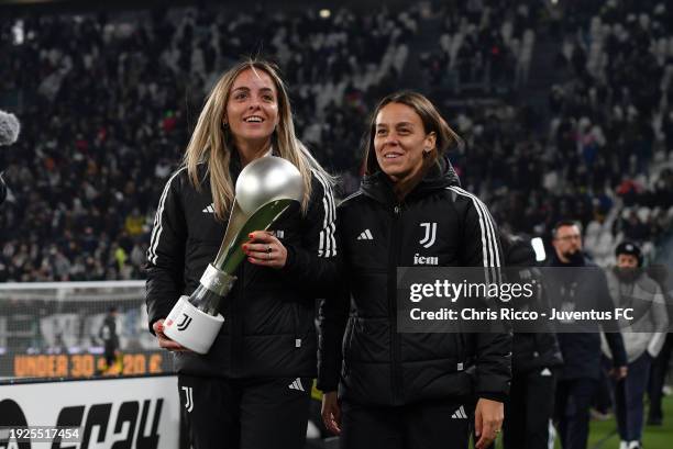 Martina Rosucci and Lisa Boattin of Juventus Women's team celebrate winning the Italian Super Cup before the Coppa Italia Quarter-Final match between...