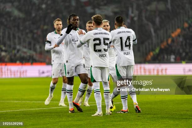 The Team of Borussia Moenchengladbach celebrate their teams second goal during the Bundesliga match between Borussia Moenchengladbach and VfB...