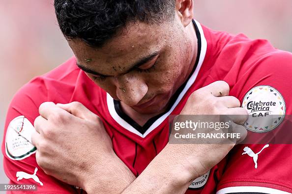 Mostafa TOPSHOT - Egypts forward Mostafa Mohamed celebrates scoring his ...