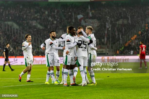 The Team of Borussia Moenchengladbach celebrate their teams second goal during the Bundesliga match between Borussia Moenchengladbach and VfB...