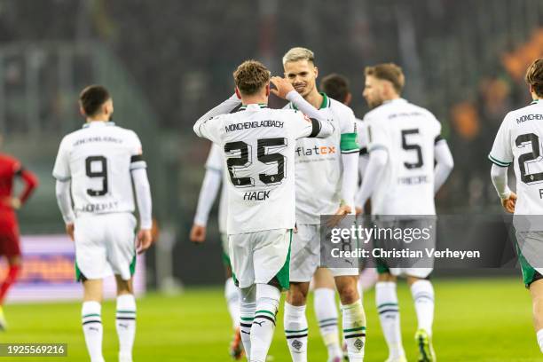 Julian Weigl and Robin Hack of Borussia Moenchengladbach celebrate their teams second goal during the Bundesliga match between Borussia...