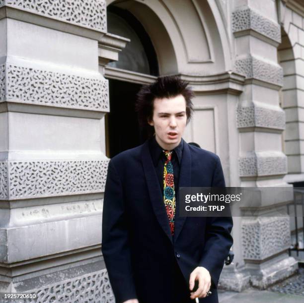 Photo of English Punk Rock musician Sid Vicious , of the group the Sex Pistols, outside Marylebone Magistrates courthouse, London, England, May 12,...