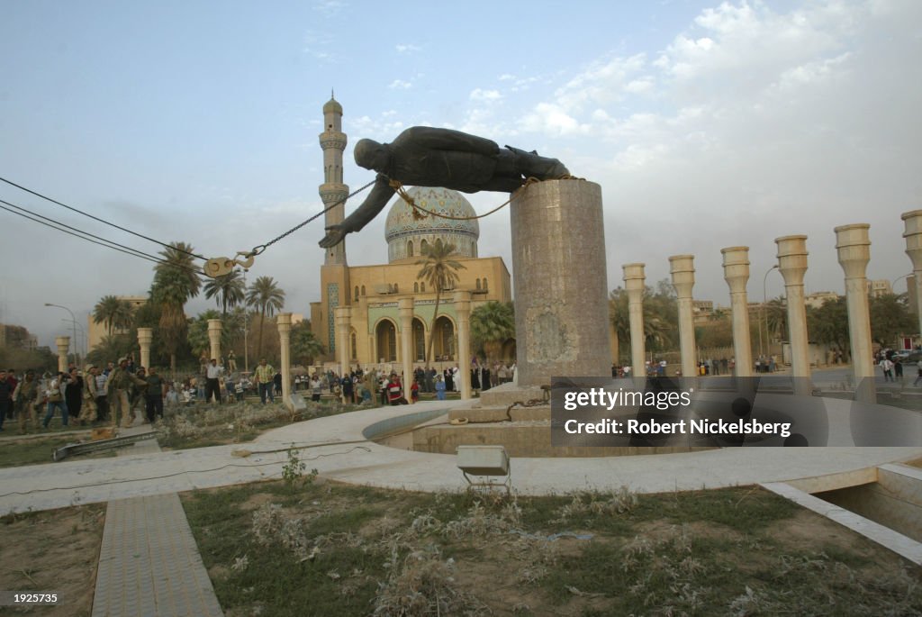 Statue Of Iraqi President Saddam Hussein Is Toppled