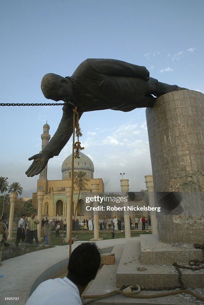 Statue Of Iraqi President Saddam Hussein Is Toppled
