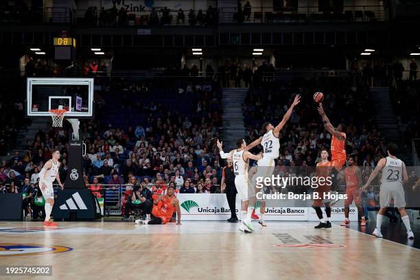 Edy Tavares of Real Madrid and Jared Harper of Valencia Basket in action during the Turkish Airlines EuroLeague Regular Season Round 21 match between...