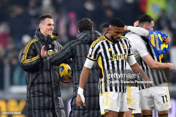 Arkadiusz Milik of Juventus celebrates victory with teammates and the match ball after scoring a hat-trick in the team's victory in the Coppa Italia...