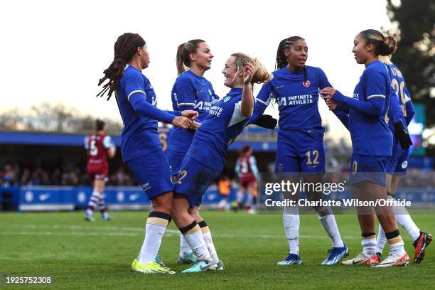 Erin Cuthbert of Chelsea celebrates scoring their 2nd goal by chest bumping Mia Fishel during the Women's FA Cup Fourth Round match between Chelsea...