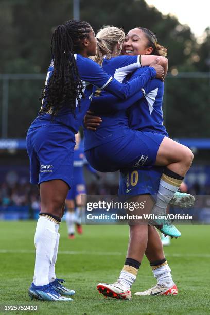 Erin Cuthbert of Chelsea celebrates scoring their 2nd goal with Ashley Lawrence and Lauren James during the Women's FA Cup Fourth Round match between...