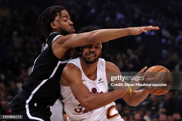 Jarrett Allen of Cleveland Cavaliers is fouled by Trendon Watford of Brooklyn Nets during the NBA match between Brooklyn Nets and Cleveland Cavaliers...