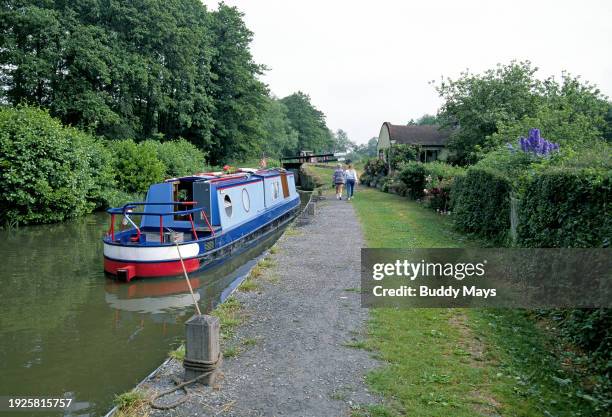 Typical canal boat or English narrowboat, about to enter a lock on the Avon River near the city of Stratford-Upon-Avon, England, 1985. .